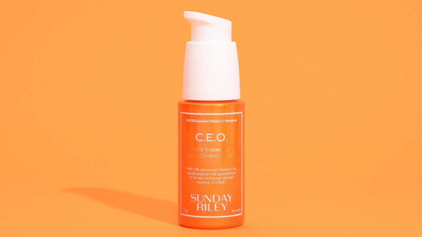 Vitamin C serum bottles editorial flatlay