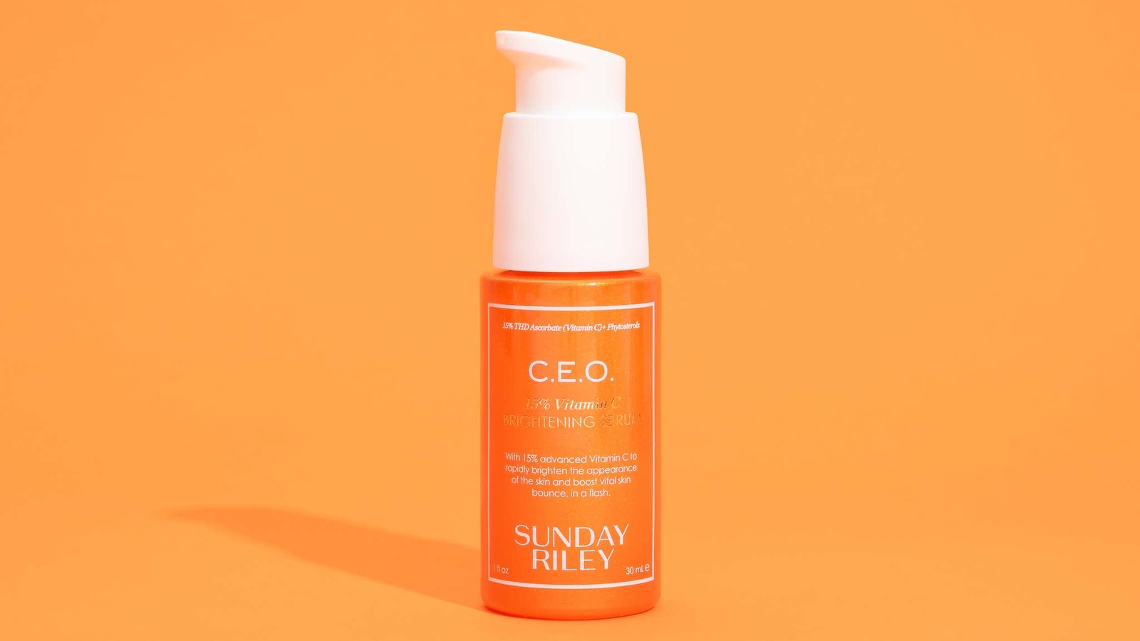 Vitamin C serum bottles editorial flatlay